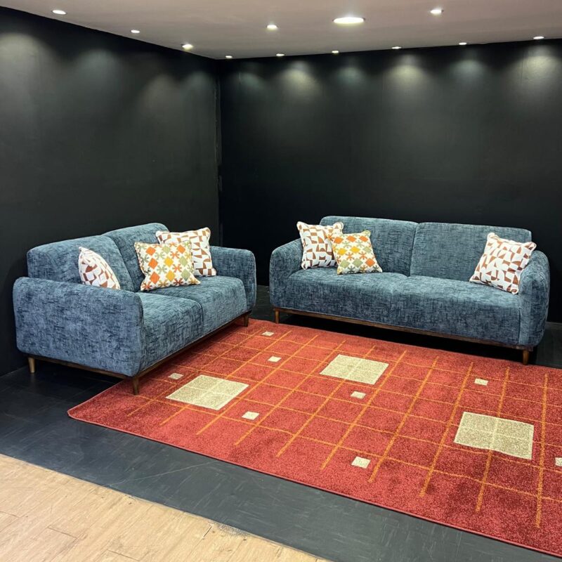 A sofa with a permanent back and seat
