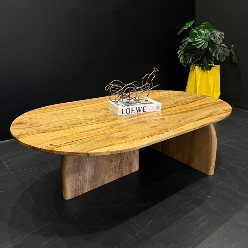 An oval mango wood coffee table