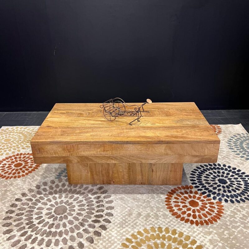A rectangular mango wood coffee table