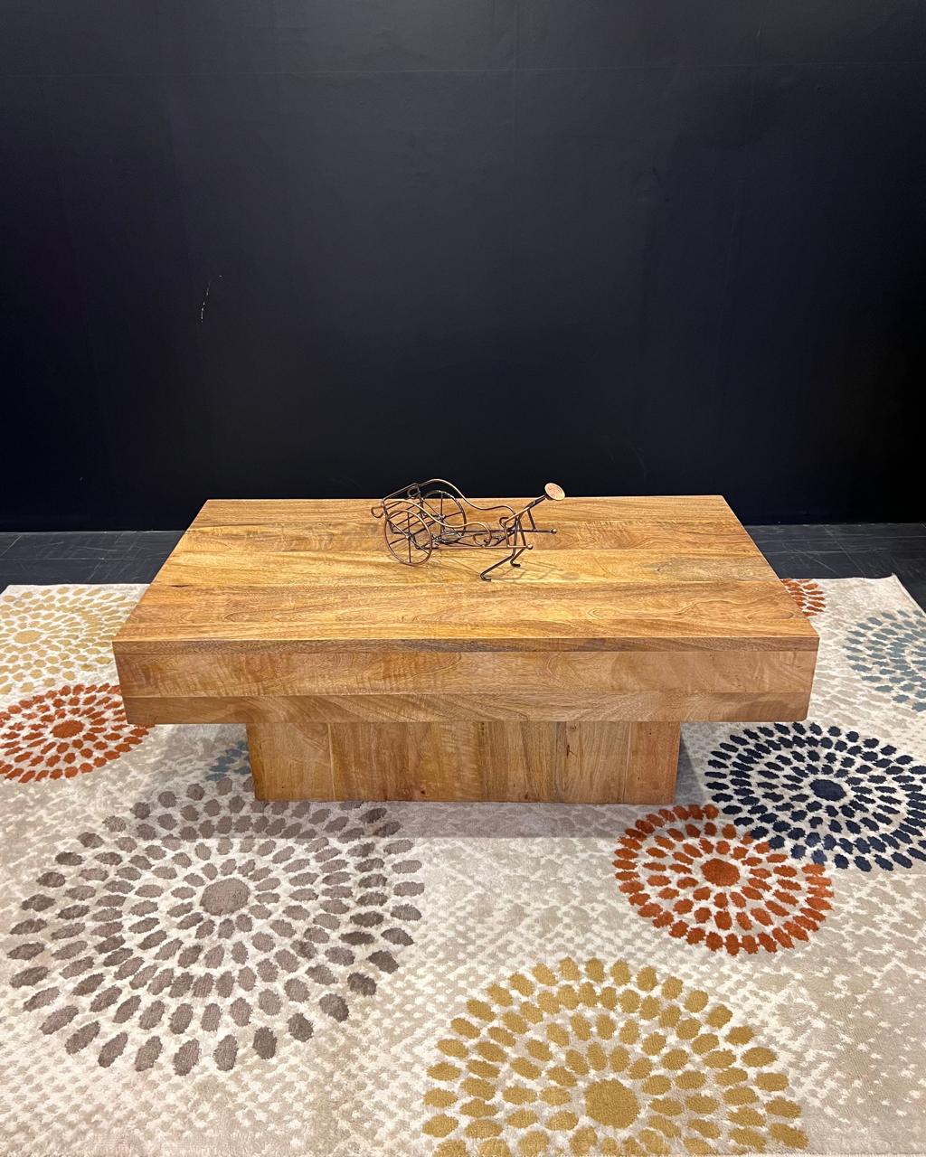 A rectangular mango wood coffee table
