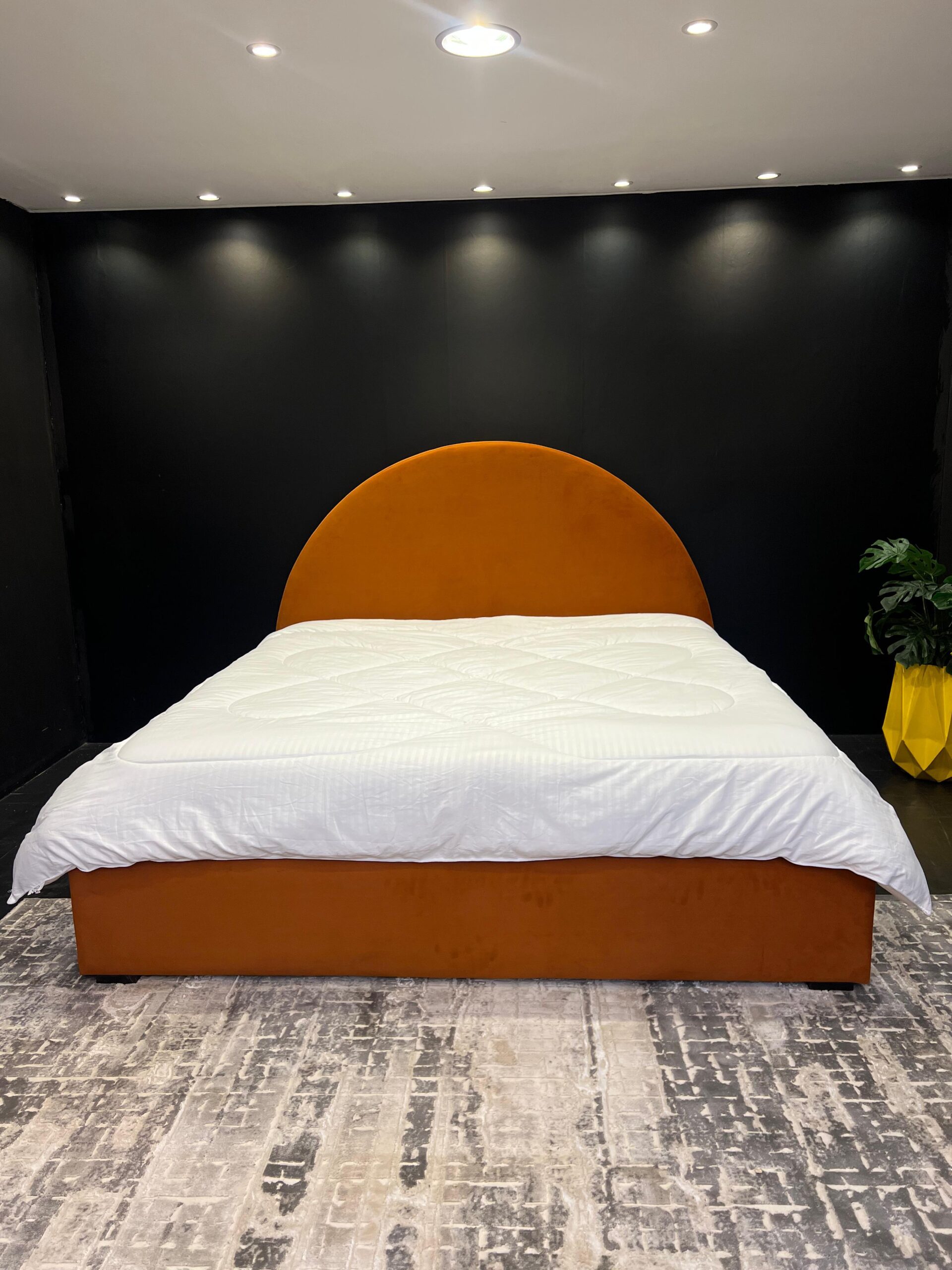 Burnt orange fabric bed