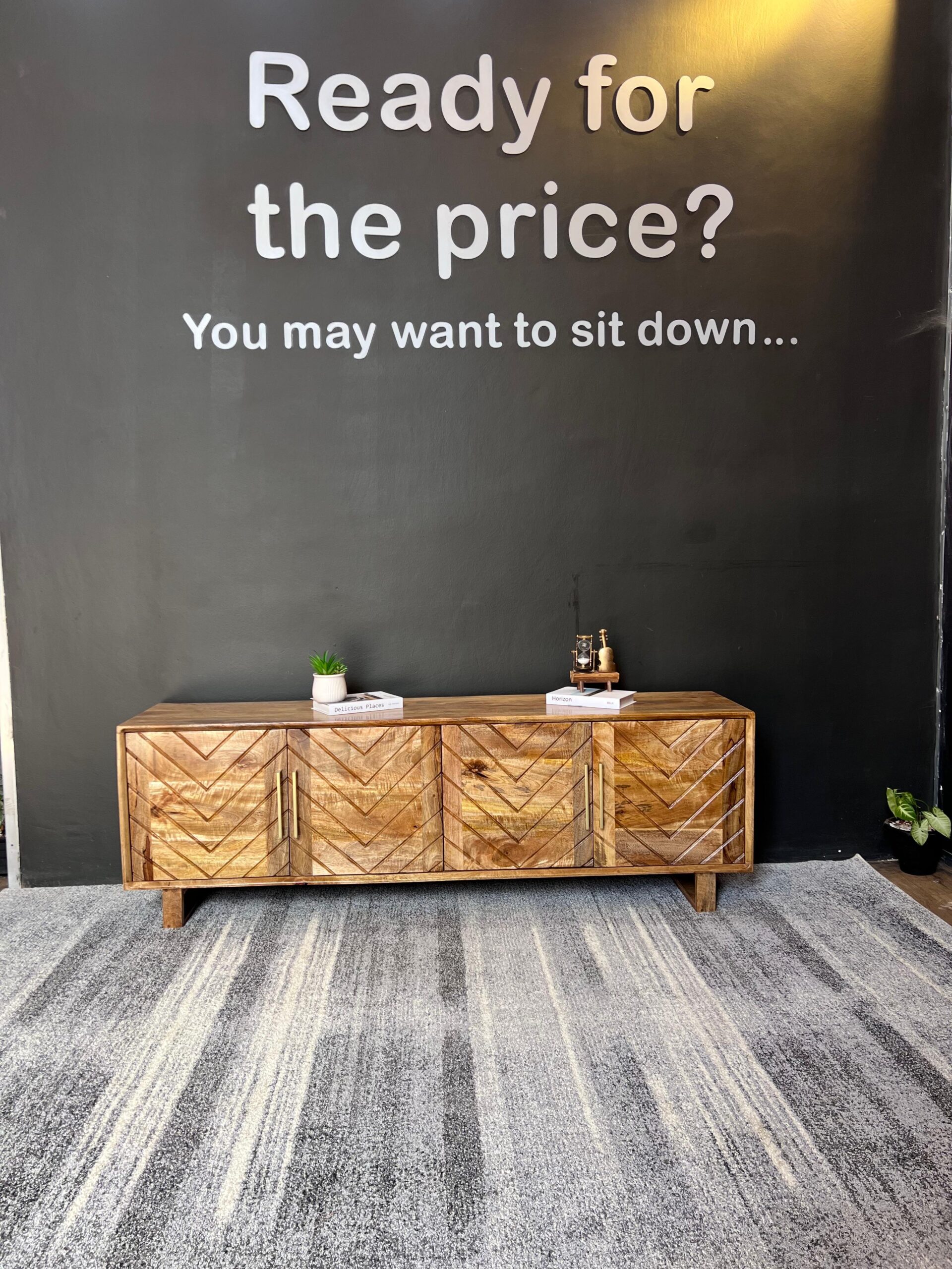 A stylish mango wood tv stand