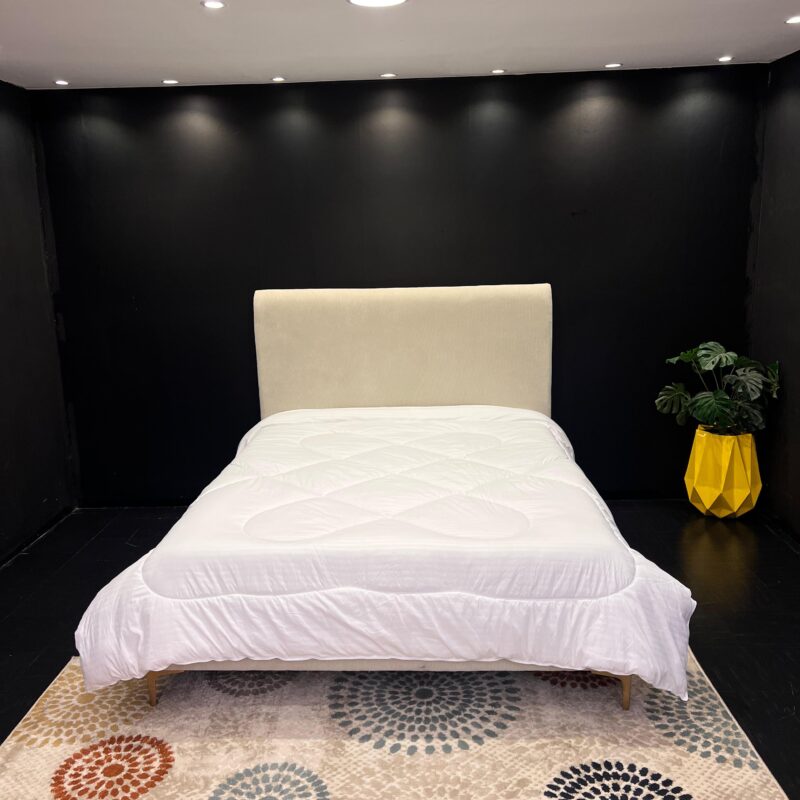 A cream white bed